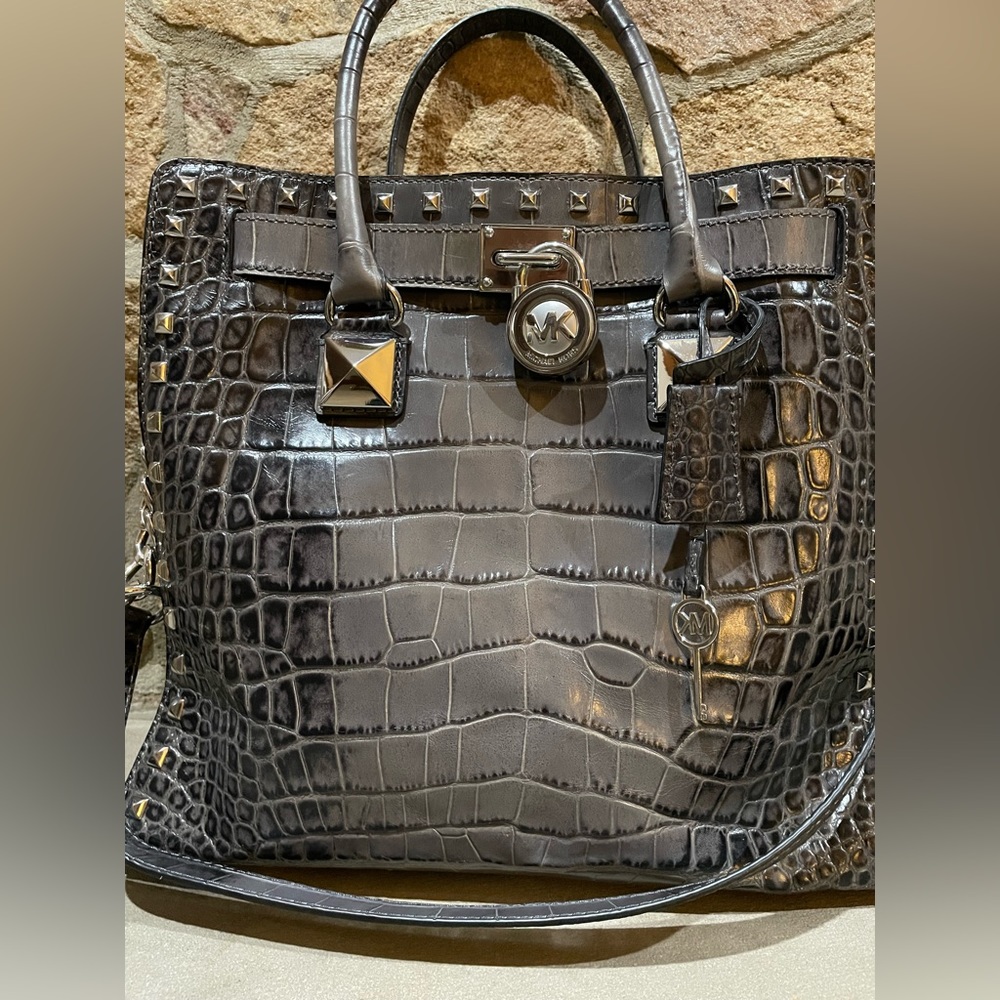 Michael Kors snake skin bag in gray with dust cover.